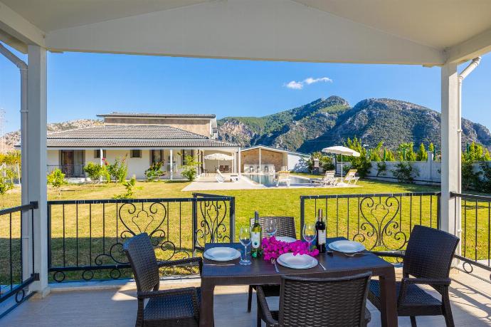 Sheltered terrace area of annex . - Villa Tolga . (Photo Gallery) }}