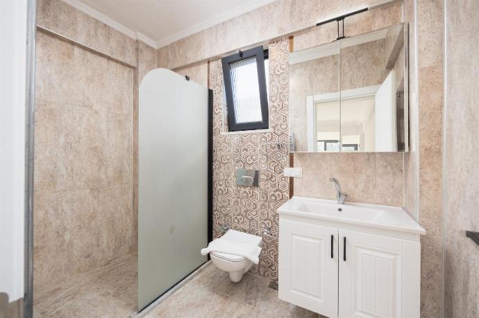 Annex: en suite bathroom with shower . - Villa Tolga . (Photo Gallery) }}