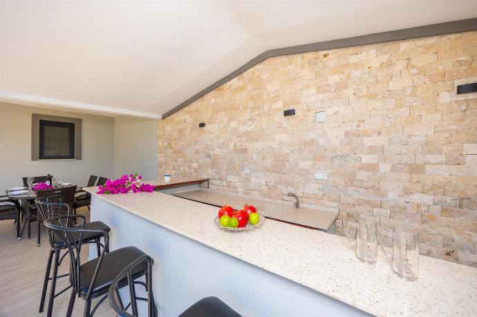 Sheltered terrace area of main building . - Villa Tolga . (Photo Gallery) }}