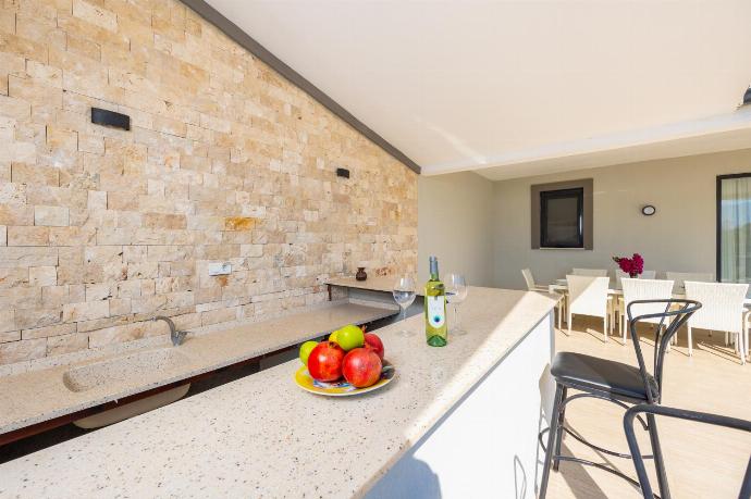 Sheltered terrace area of main building . - Villa Funda . (Photo Gallery) }}
