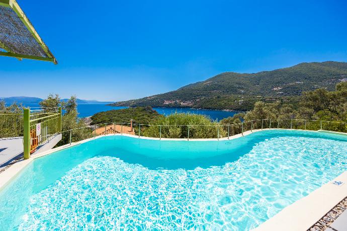 Private pool and terrace with sea views . - Villa Anemus . (Photo Gallery) }}
