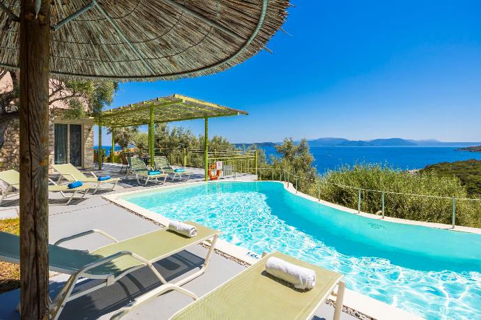 Private pool and terrace with sea views . - Villa Anemus . (Photo Gallery) }}