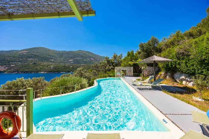 Private pool and terrace with sea views . - Villa Anemus . (Photo Gallery) }}