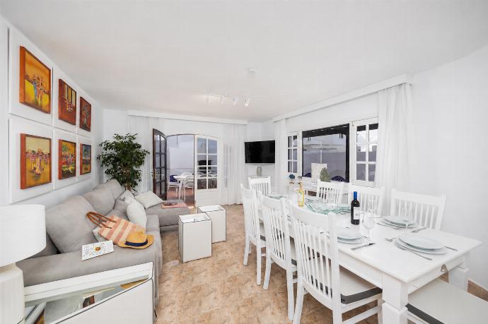 Living room with sofas, dining area, A/C, WiFi internet, and satellite TV . - Villa Dulce . (Photo Gallery) }}
