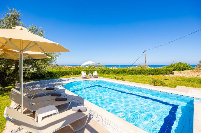 Private pool and terrace with sea views . - Villa Eleni . (Photo Gallery) }}