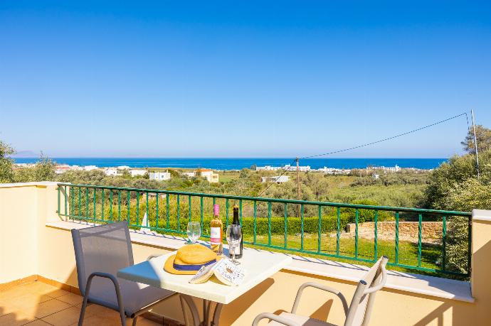 Balcony with sea views . - Villa Eleni . (Photo Gallery) }}