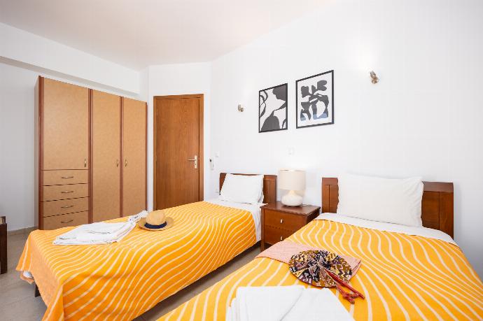 Twin bedroom with A/C . - Villa Eleni . (Photo Gallery) }}