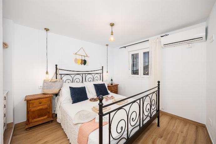 Double bedroom with A/C . - Villa El Cortijo . (Photo Gallery) }}