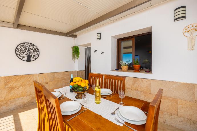 Sheltered terrace area . - Villa El Cortijo . (Photo Gallery) }}