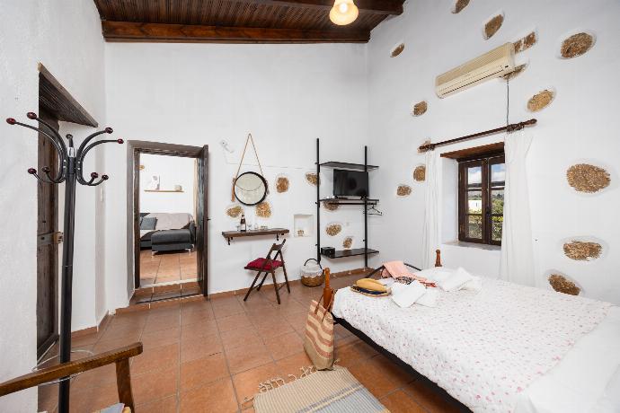 Double bedroom with A/C . - Villa Roupes Stone . (Photo Gallery) }}
