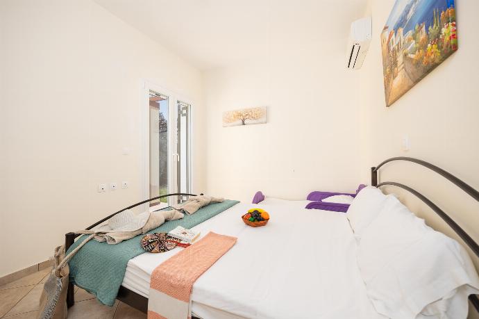 Double bedroom with A/C . - Villa Iremia . (Photo Gallery) }}