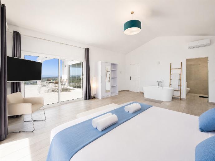 Twin bedroom with en suite bathroom, A/C, and sea views . - The View . (Photo Gallery) }}