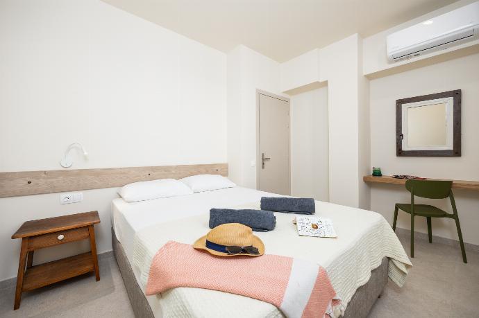 Double bedroom with A/C . - Villa Erofili . (Photo Gallery) }}
