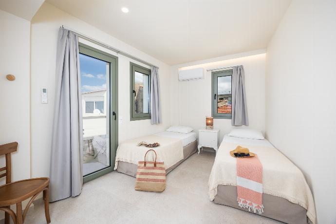 Twin bedroom with A/C . - Villa Erofili . (Photo Gallery) }}