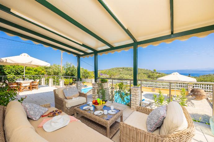Sheltered terrace area with sea views . - Villa Afroditi . (Photo Gallery) }}