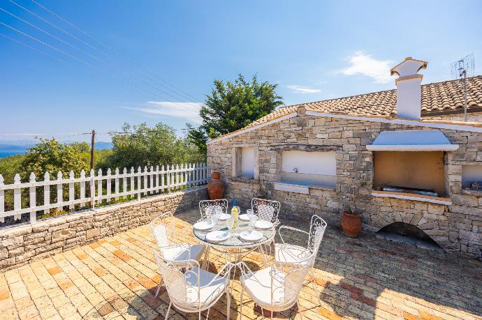 Terrace area with BBQ . - Villa Afroditi . (Photo Gallery) }}