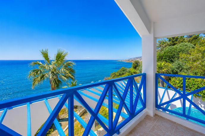 Private balcony with bright blue railings and breathtaking panoramic sea views. . - Panorama Villa . (Photo Gallery) }}