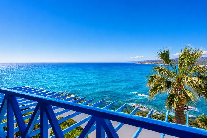 Private balcony with blue railings and breathtaking panoramic sea views. . - Panorama Villa . (Photo Gallery) }}