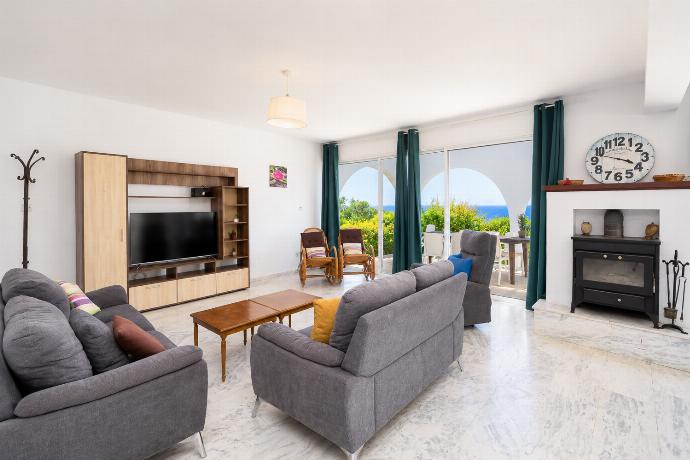 Living room with sofas, WiFi internet, and satellite TV . - Panorama Villa . (Photo Gallery) }}