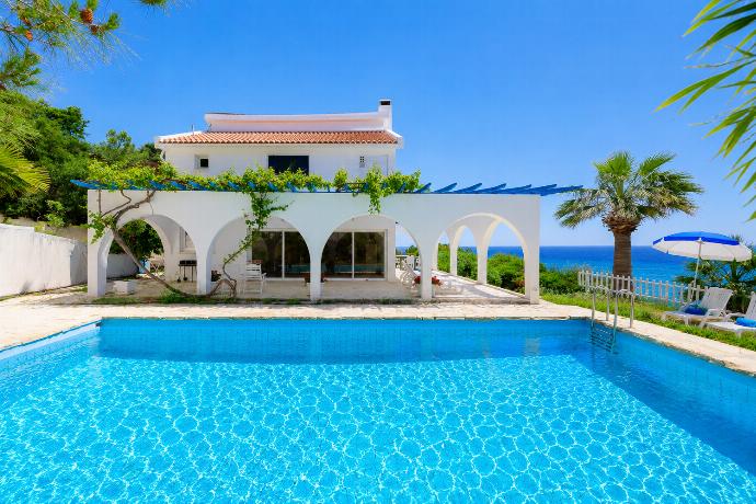 ,Seafront villa with a large private pool, arched terrace, and beautiful Mediterranean views. . - Panorama Villa . (Photo Gallery) }}