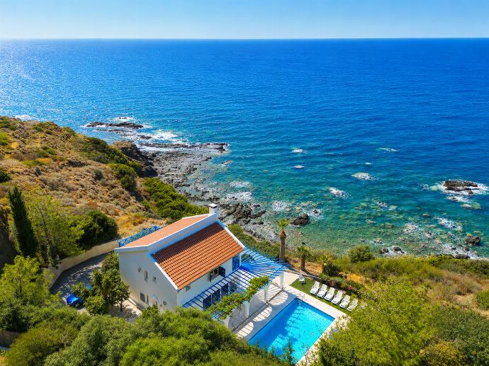 Aerial seafront villa with a private pool, lush surroundings, and stunning panoramic ocean views. . - Panorama Villa . (Photo Gallery) }}
