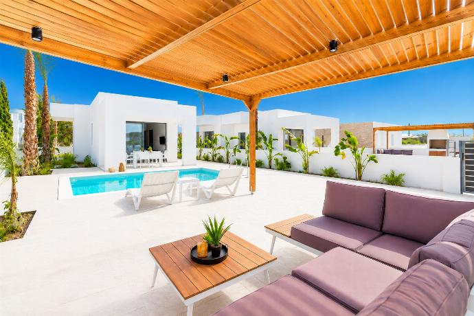 Terrace area . - Villa Salty Sun 4 . (Galerie de photos) }}