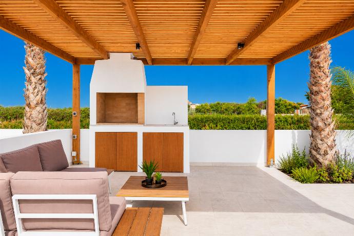 Terrace area . - Villa Salty Sun 4 . (Galerie de photos) }}