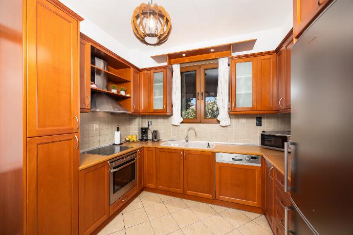 Equipped kitchen . - Villa Aspa . (Photo Gallery) }}