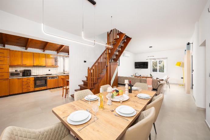 Living room with sofa, dining area, A/C, WiFi internet, and satellite TV . - Villa Filia . (Photo Gallery) }}