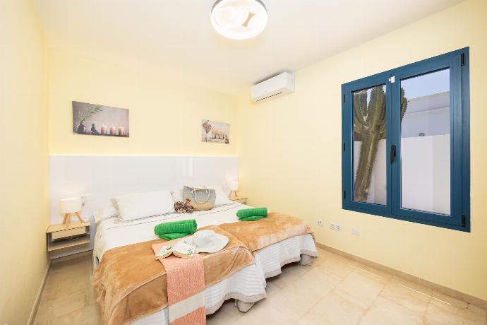 Twin bedroom with A/C . - Villa Concha . (Photo Gallery) }}
