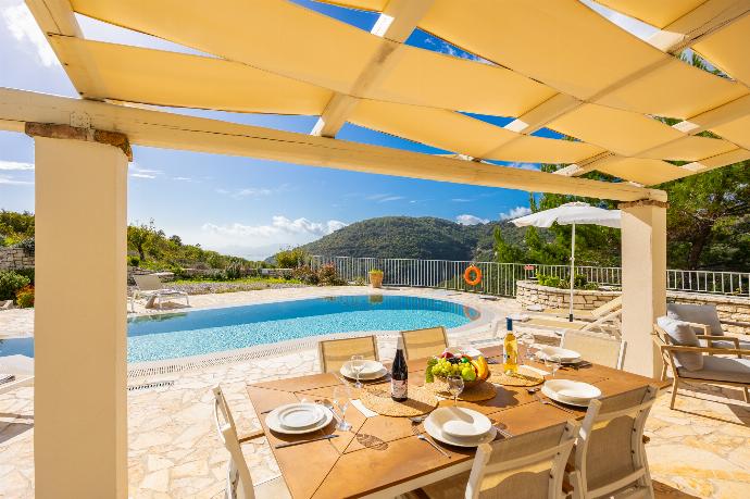 Sheltered terrace area . - Villa Socrates . (Photo Gallery) }}