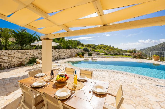 Sheltered terrace area . - Villa Socrates . (Photo Gallery) }}