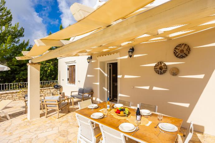 Sheltered terrace area . - Villa Socrates . (Photo Gallery) }}