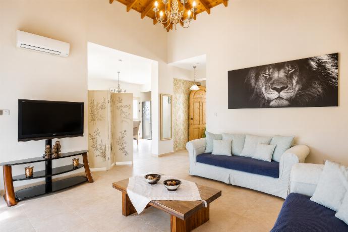 Living room with sofas, A/C, WiFi internet, and satellite TV . - Villa Lone . (Photo Gallery) }}