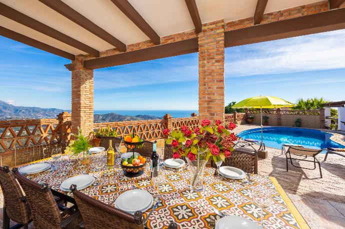 Sheltered terrace area with sea views . - Villa Baena . (Photo Gallery) }}