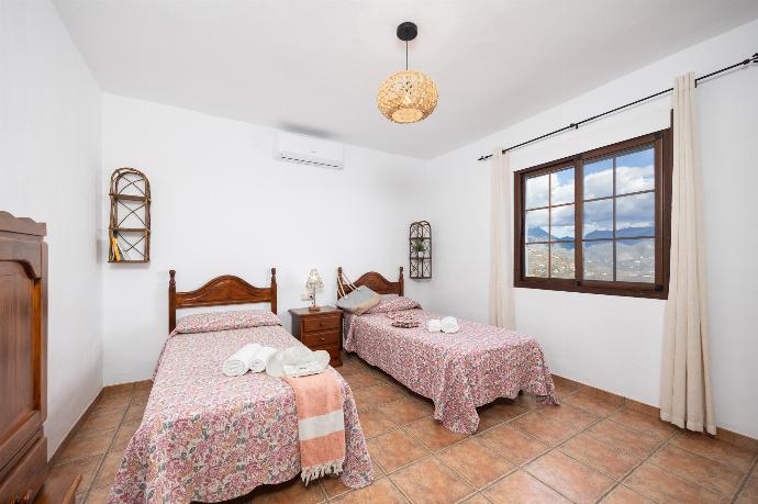 Twin bedroom with A/C . - Villa Baena . (Photo Gallery) }}