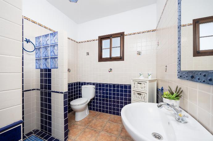 Family bathroom with shower . - Villa Baena . (Photo Gallery) }}