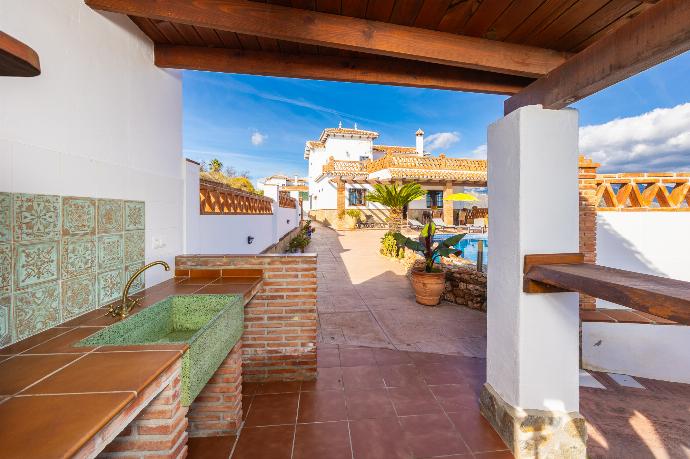 Sheltered terrace area . - Villa Baena . (Photo Gallery) }}