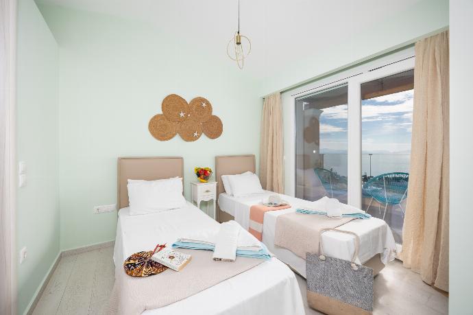 Twin bedroom with en suite bathroom and A/C . - Villa Damian . (Photo Gallery) }}