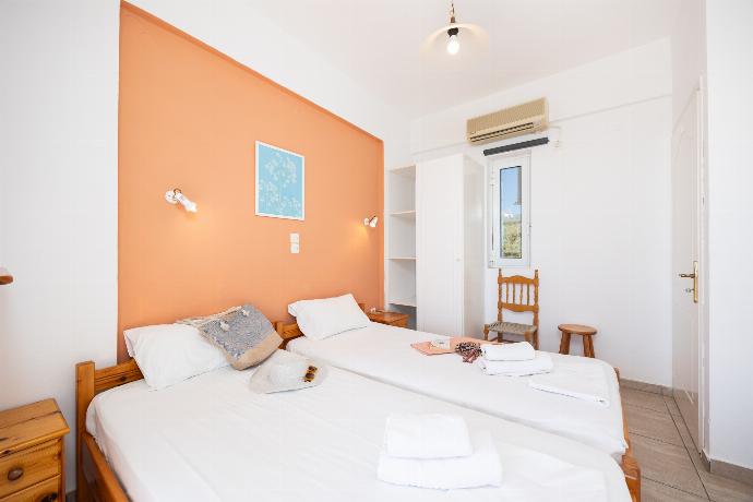 Twin bedroom with A/C and sea views . - Villa Cleo . (Photo Gallery) }}