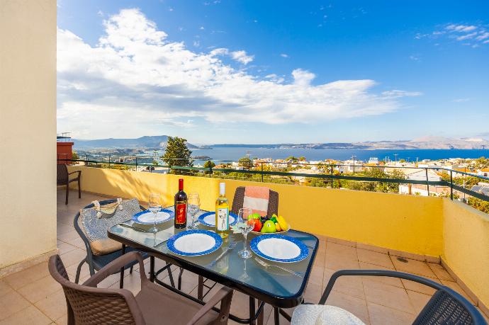 Terrace area with sea views . - Villa Aphrodite . (Photo Gallery) }}