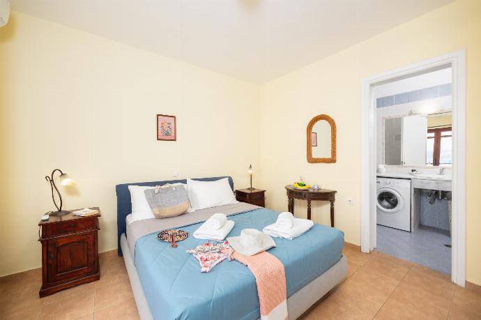 Double bedroom with shared en suite bathroom, A/C, and sea views . - Villa Aphrodite . (Photo Gallery) }}