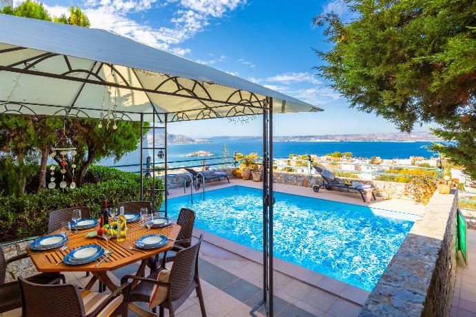 Terrace area with sea views . - Villa Ikaros . (Photo Gallery) }}