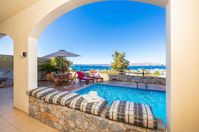 Sheltered terrace area with sea views . - Odysseus Villa . (Photo Gallery) }}