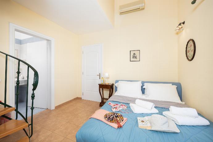 Double bedroom with en suite bathroom and A/C . - Odysseus Villa . (Photo Gallery) }}