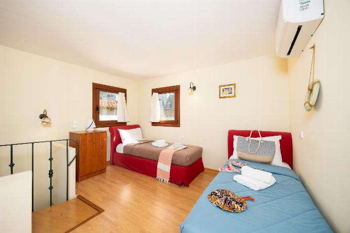 Twin bedroom with A/C . - Odysseus Villa . (Photo Gallery) }}