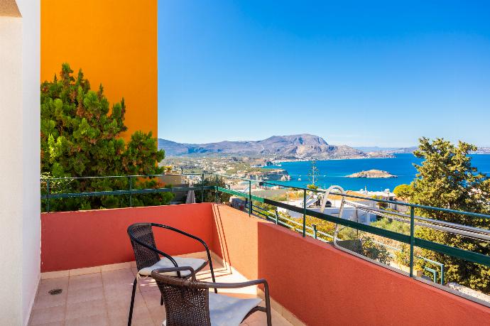 Terrace area with sea views . - Villa Persephone . (Photo Gallery) }}