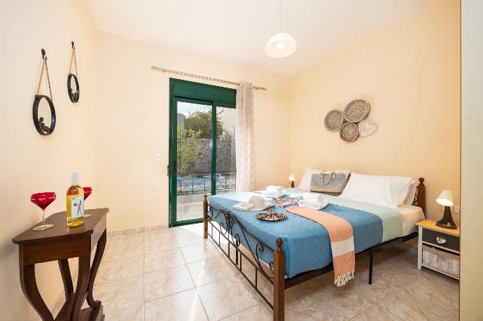 Double bedroom with A/C . - Villa Phoebe . (Photo Gallery) }}