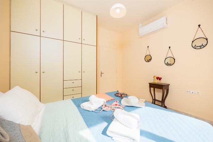 Double bedroom with A/C . - Villa Phoebe . (Photo Gallery) }}