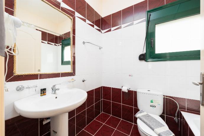 Family bathroom with bath and shower . - Villa Phoebe . (Photo Gallery) }}